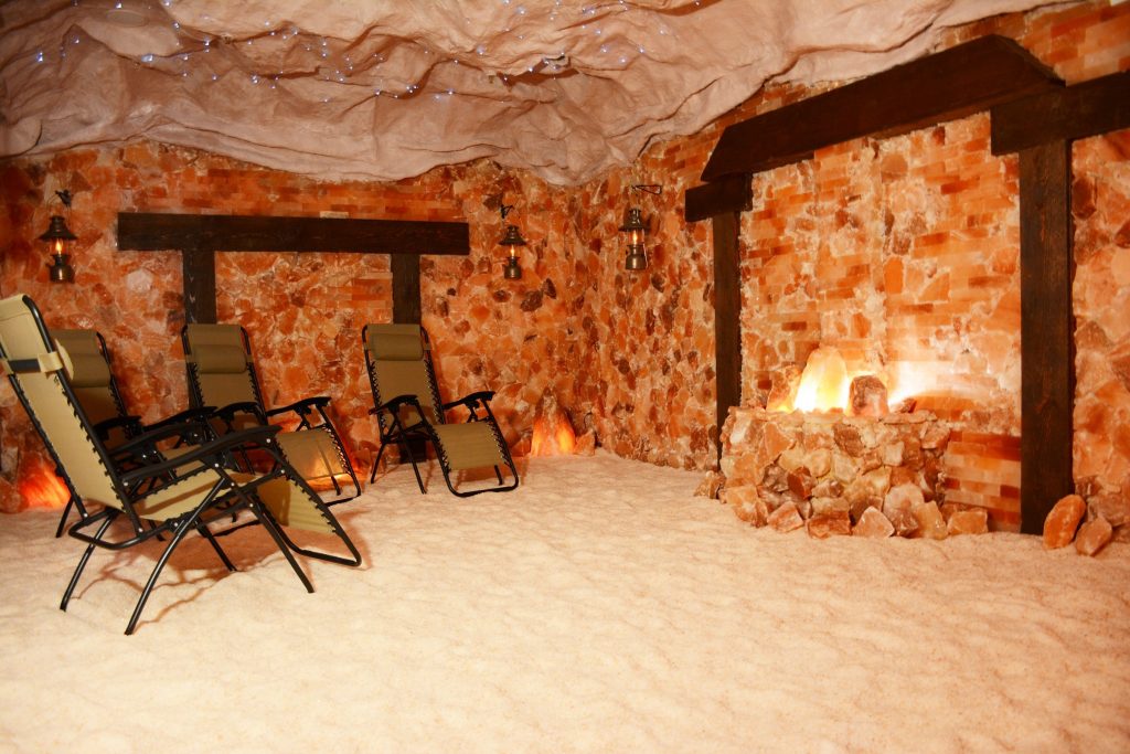 The salt cave, walls and floor of pink salt, set with reclining chairs